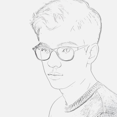A Young Boy in Glasses Capturing the Essence of Imagination